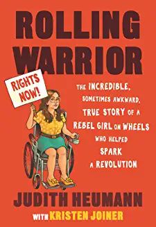 Cover for Rolling Warrior with woman in wheelchair holding sign that says Rights Now